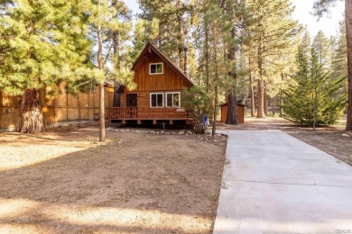 Enveloped by a quiet grove of mature pines and backing to a on Big Bear Mountain Ski and Golf Resort in California - for sale on GolfHomes.com, golf home, golf lot