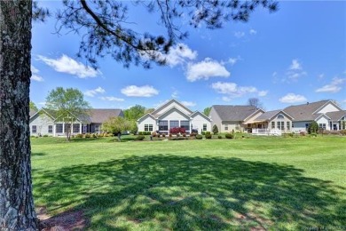 A truly coveted *Christopher Wren* model overlooking the fairway on Colonial Heritage Golf Club in Virginia - for sale on GolfHomes.com, golf home, golf lot