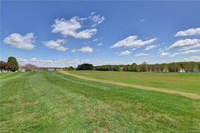 A truly coveted *Christopher Wren* model overlooking the fairway on Colonial Heritage Golf Club in Virginia - for sale on GolfHomes.com, golf home, golf lot