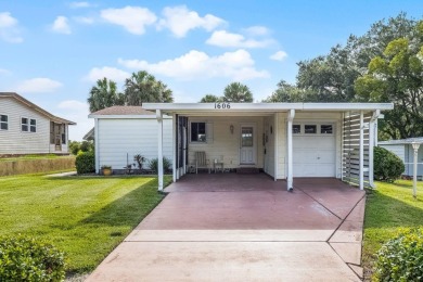 Enjoy golf course views from this well-maintained 2-bedroom on Orange Blossom Hills Golf and Country Club in Florida - for sale on GolfHomes.com, golf home, golf lot
