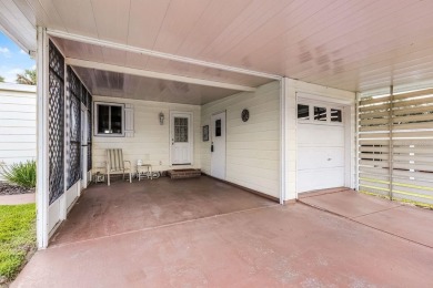 Enjoy golf course views from this well-maintained 2-bedroom on Orange Blossom Hills Golf and Country Club in Florida - for sale on GolfHomes.com, golf home, golf lot