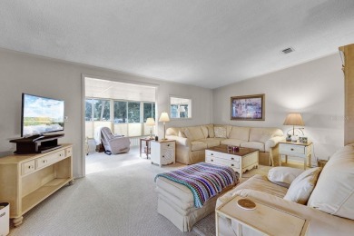 Enjoy golf course views from this well-maintained 2-bedroom on Orange Blossom Hills Golf and Country Club in Florida - for sale on GolfHomes.com, golf home, golf lot