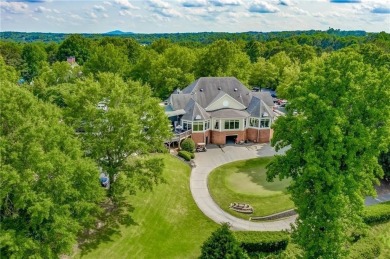 Welcome to your FULLY UPDATED 5-bedroom, 4.5-bath dream home on Towne Lake Hills Golf Club in Georgia - for sale on GolfHomes.com, golf home, golf lot