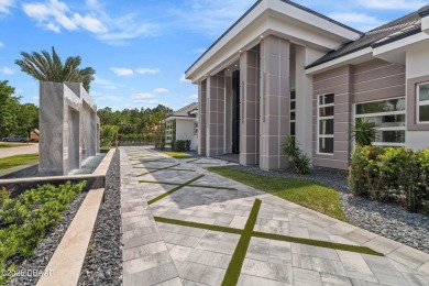 Step into a Masterpiece of Modern Sophistication

Privately on Plantation Bay Golf and Country Club in Florida - for sale on GolfHomes.com, golf home, golf lot