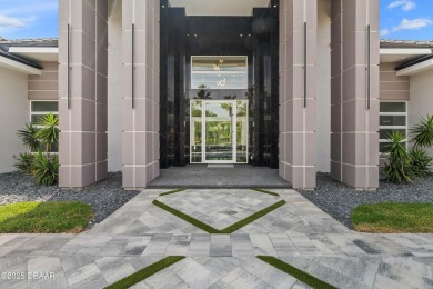 Step into a Masterpiece of Modern Sophistication

Privately on Plantation Bay Golf and Country Club in Florida - for sale on GolfHomes.com, golf home, golf lot