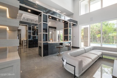 Step into a Masterpiece of Modern Sophistication

Privately on Plantation Bay Golf and Country Club in Florida - for sale on GolfHomes.com, golf home, golf lot