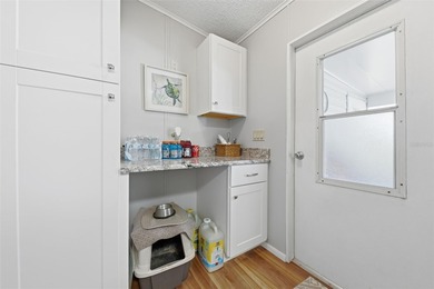 This Polo Park beauty features numerous recent updates on Polo Park Golf Course in Florida - for sale on GolfHomes.com, golf home, golf lot