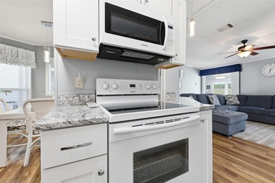 This Polo Park beauty features numerous recent updates on Polo Park Golf Course in Florida - for sale on GolfHomes.com, golf home, golf lot