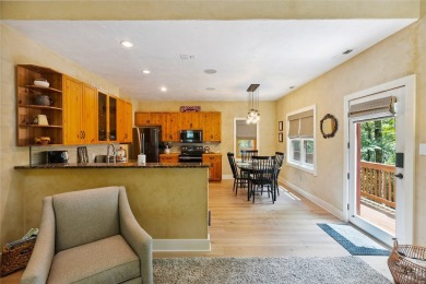 Nestled in the heart of North Carolina's Blue Ridge Mountains on Sapphire National Golf Club in North Carolina - for sale on GolfHomes.com, golf home, golf lot