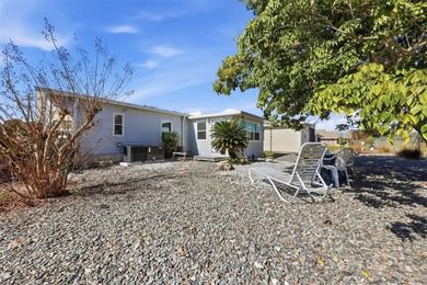 This Polo Park beauty features numerous recent updates on Polo Park Golf Course in Florida - for sale on GolfHomes.com, golf home, golf lot