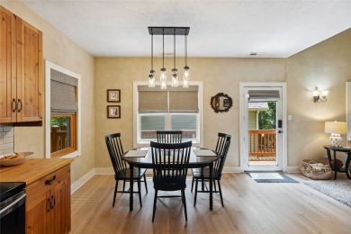 Nestled in the heart of North Carolina's Blue Ridge Mountains on Sapphire National Golf Club in North Carolina - for sale on GolfHomes.com, golf home, golf lot
