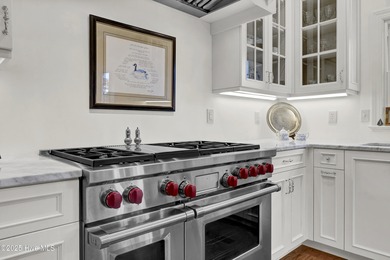 A timeless classic residence offering exceptional craftsmanship on Country Club of Landfall in North Carolina - for sale on GolfHomes.com, golf home, golf lot