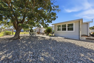 This Polo Park beauty features numerous recent updates on Polo Park Golf Course in Florida - for sale on GolfHomes.com, golf home, golf lot