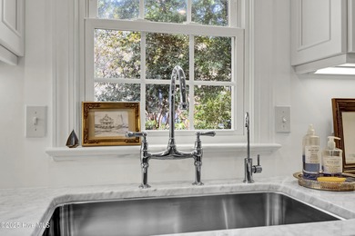 A timeless classic residence offering exceptional craftsmanship on Country Club of Landfall in North Carolina - for sale on GolfHomes.com, golf home, golf lot