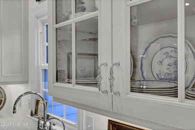 A timeless classic residence offering exceptional craftsmanship on Country Club of Landfall in North Carolina - for sale on GolfHomes.com, golf home, golf lot