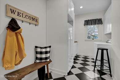 A timeless classic residence offering exceptional craftsmanship on Country Club of Landfall in North Carolina - for sale on GolfHomes.com, golf home, golf lot