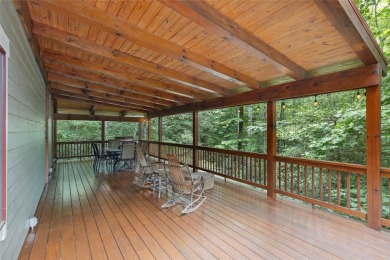 Nestled in the heart of North Carolina's Blue Ridge Mountains on Sapphire National Golf Club in North Carolina - for sale on GolfHomes.com, golf home, golf lot