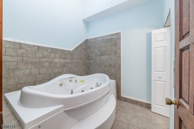 LIVE THE LAKE LIFE THIS SUMMER !  Exceptional 3-bedroom, 3-bath on Highland Lakes Country Club in New Jersey - for sale on GolfHomes.com, golf home, golf lot
