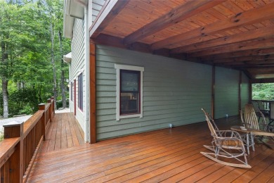 Nestled in the heart of North Carolina's Blue Ridge Mountains on Sapphire National Golf Club in North Carolina - for sale on GolfHomes.com, golf home, golf lot