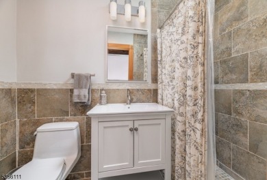 LIVE THE LAKE LIFE THIS SUMMER !  Exceptional 3-bedroom, 3-bath on Highland Lakes Country Club in New Jersey - for sale on GolfHomes.com, golf home, golf lot