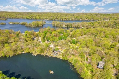 LIVE THE LAKE LIFE THIS SUMMER !  Exceptional 3-bedroom, 3-bath on Highland Lakes Country Club in New Jersey - for sale on GolfHomes.com, golf home, golf lot