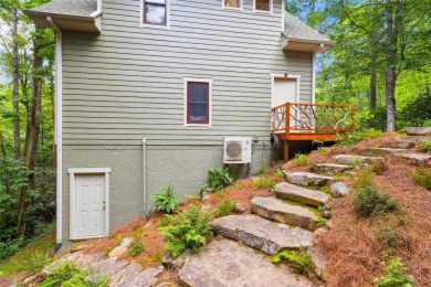 Nestled in the heart of North Carolina's Blue Ridge Mountains on Sapphire National Golf Club in North Carolina - for sale on GolfHomes.com, golf home, golf lot