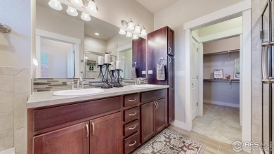 HUGE PRICE REDUCTION ON THIS IMMACULATE 1 OWNER TOWNHOME WITH on Highland Meadows Golf Course in Colorado - for sale on GolfHomes.com, golf home, golf lot