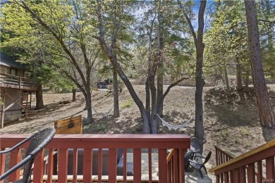 Nestled back from the road with an amazing private backyard is on Big Bear Mountain Ski and Golf Resort in California - for sale on GolfHomes.com, golf home, golf lot