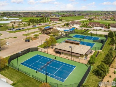 HUGE PRICE REDUCTION ON THIS IMMACULATE 1 OWNER TOWNHOME WITH on Highland Meadows Golf Course in Colorado - for sale on GolfHomes.com, golf home, golf lot