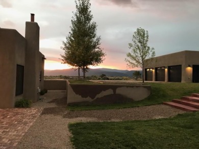 Situated on 6.77 acres spanning three independent parcels (two on Taos Country Club in New Mexico - for sale on GolfHomes.com, golf home, golf lot
