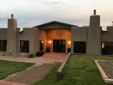 Situated on 6.77 acres spanning three independent parcels (two on Taos Country Club in New Mexico - for sale on GolfHomes.com, golf home, golf lot
