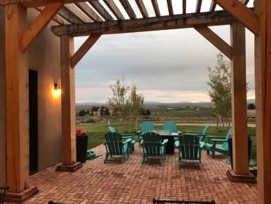 Situated on 6.77 acres spanning three independent parcels (two on Taos Country Club in New Mexico - for sale on GolfHomes.com, golf home, golf lot