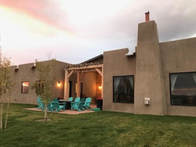 Situated on 6.77 acres spanning three independent parcels (two on Taos Country Club in New Mexico - for sale on GolfHomes.com, golf home, golf lot