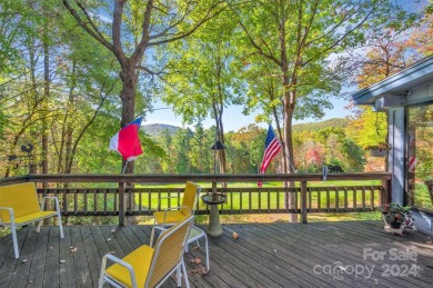 Remarkable golf course and mountain views from this immaculately on Lake Toxaway Country Club in North Carolina - for sale on GolfHomes.com, golf home, golf lot