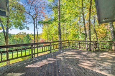 Remarkable golf course and mountain views from this immaculately on Lake Toxaway Country Club in North Carolina - for sale on GolfHomes.com, golf home, golf lot