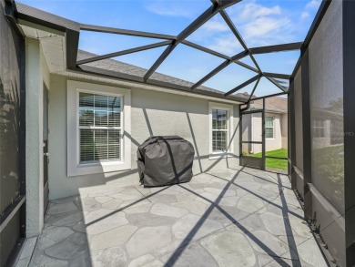 This stretched Begonia Designer model checks all the boxes on Evans Prairie Golf and Country Club in Florida - for sale on GolfHomes.com, golf home, golf lot