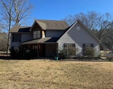 With some TLC This Diamond in the Rough Could Be a Gem Again on The Dogwoods Golf Course At Hugh White State Park in Mississippi - for sale on GolfHomes.com, golf home, golf lot