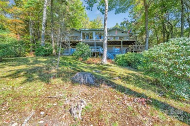 Remarkable golf course and mountain views from this immaculately on Lake Toxaway Country Club in North Carolina - for sale on GolfHomes.com, golf home, golf lot