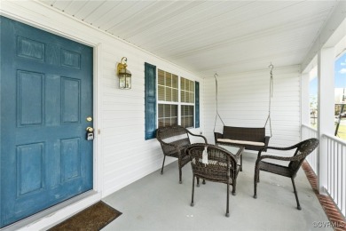 An inviting Two Story, 4 Bedroom, 2.5 Bath Colonial centrally on Hobbs Hole Golf Course in Virginia - for sale on GolfHomes.com, golf home, golf lot