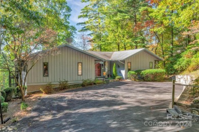 Remarkable golf course and mountain views from this immaculately on Lake Toxaway Country Club in North Carolina - for sale on GolfHomes.com, golf home, golf lot