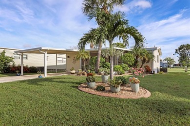 Sassy and charming 2 bedroom, 2 full bath home in award-winning on Maple Leaf Golf and Country Club in Florida - for sale on GolfHomes.com, golf home, golf lot