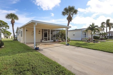 Sassy and charming 2 bedroom, 2 full bath home in award-winning on Maple Leaf Golf and Country Club in Florida - for sale on GolfHomes.com, golf home, golf lot