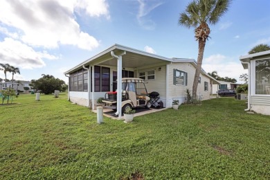 Sassy and charming 2 bedroom, 2 full bath home in award-winning on Maple Leaf Golf and Country Club in Florida - for sale on GolfHomes.com, golf home, golf lot