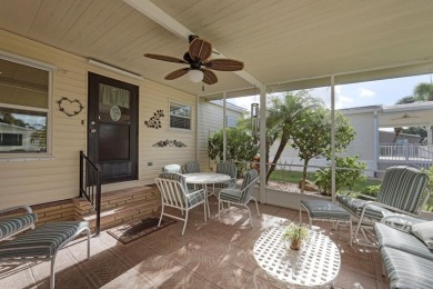 Sassy and charming 2 bedroom, 2 full bath home in award-winning on Maple Leaf Golf and Country Club in Florida - for sale on GolfHomes.com, golf home, golf lot
