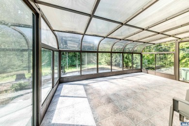 Gorgeous one level home in Sunland on the golf course with a on SunLand Golf and Country Club in Washington - for sale on GolfHomes.com, golf home, golf lot
