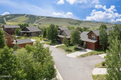 Gorgeous ski-in/ski-out 5 bedroom home that is bright, light and on Headwaters Golf Course At Granby Ranch in Colorado - for sale on GolfHomes.com, golf home, golf lot