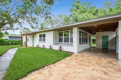 This fully remodeled 2 bedroom, 1.5 bathroom single story home on The Dunedin Country Club in Florida - for sale on GolfHomes.com, golf home, golf lot