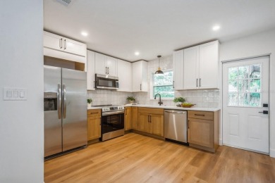 This fully remodeled 2 bedroom, 1.5 bathroom single story home on The Dunedin Country Club in Florida - for sale on GolfHomes.com, golf home, golf lot