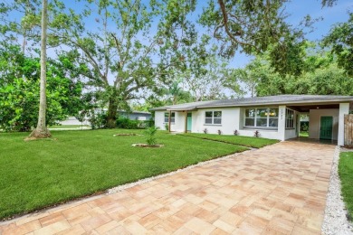 This fully remodeled 2 bedroom, 1.5 bathroom single story home on The Dunedin Country Club in Florida - for sale on GolfHomes.com, golf home, golf lot