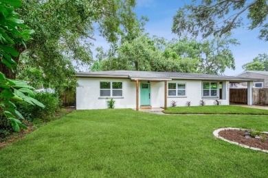 This fully remodeled 2 bedroom, 1.5 bathroom single story home on The Dunedin Country Club in Florida - for sale on GolfHomes.com, golf home, golf lot